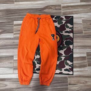 Puma x Ami orange sweatpants